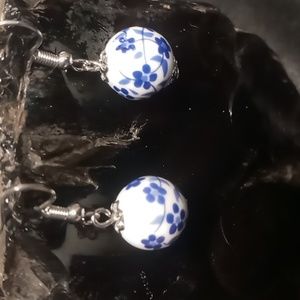 Baked beads porcelain with blue floral print.